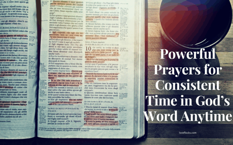 An open Bible beside a lit candle and a cup of coffee,