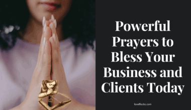 Hands put together in prayer over a business meeting with clients