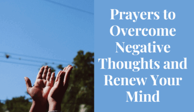 A person praying with hands lifted