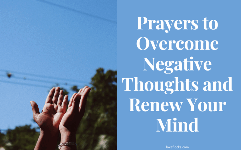 A person praying with hands lifted