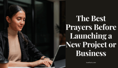 A Christian entrepreneur over a laptop and journal before launching a new business