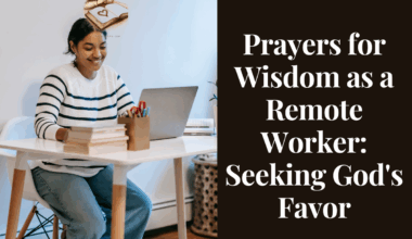 A focused remote worker smiling at a desk after receiving a new job with Bible and laptop open